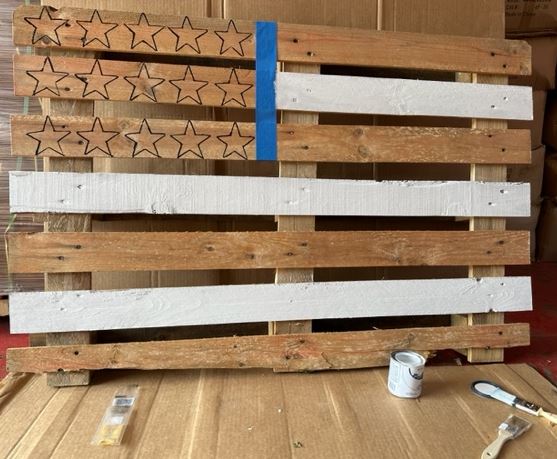 flag pallet painted with white strips