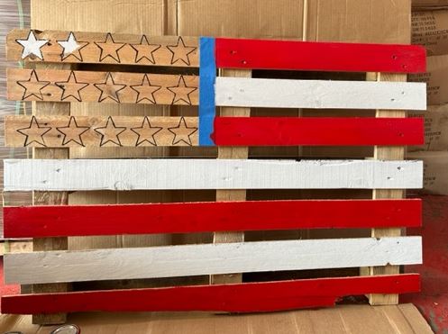 flag pallet painted with red and white strips